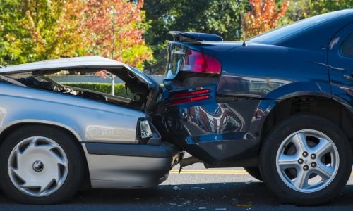 Auto accident involving two cars on a city street